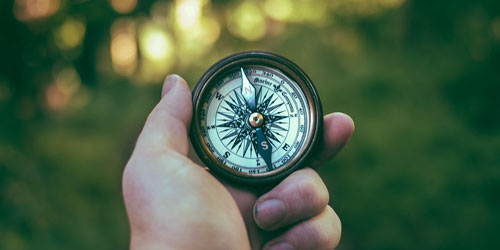 hiker with compass