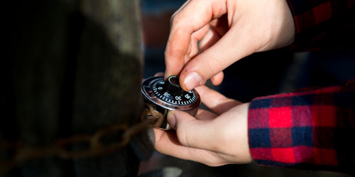 Person opening a lock