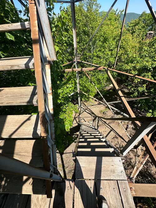 The first set of stairs on the tower lack one of the side railings Shuckstack Fire Tower via the AT