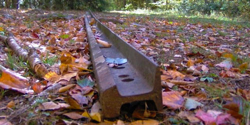A stray railroad beam on Middle Prong Trail by Brian Stansberry